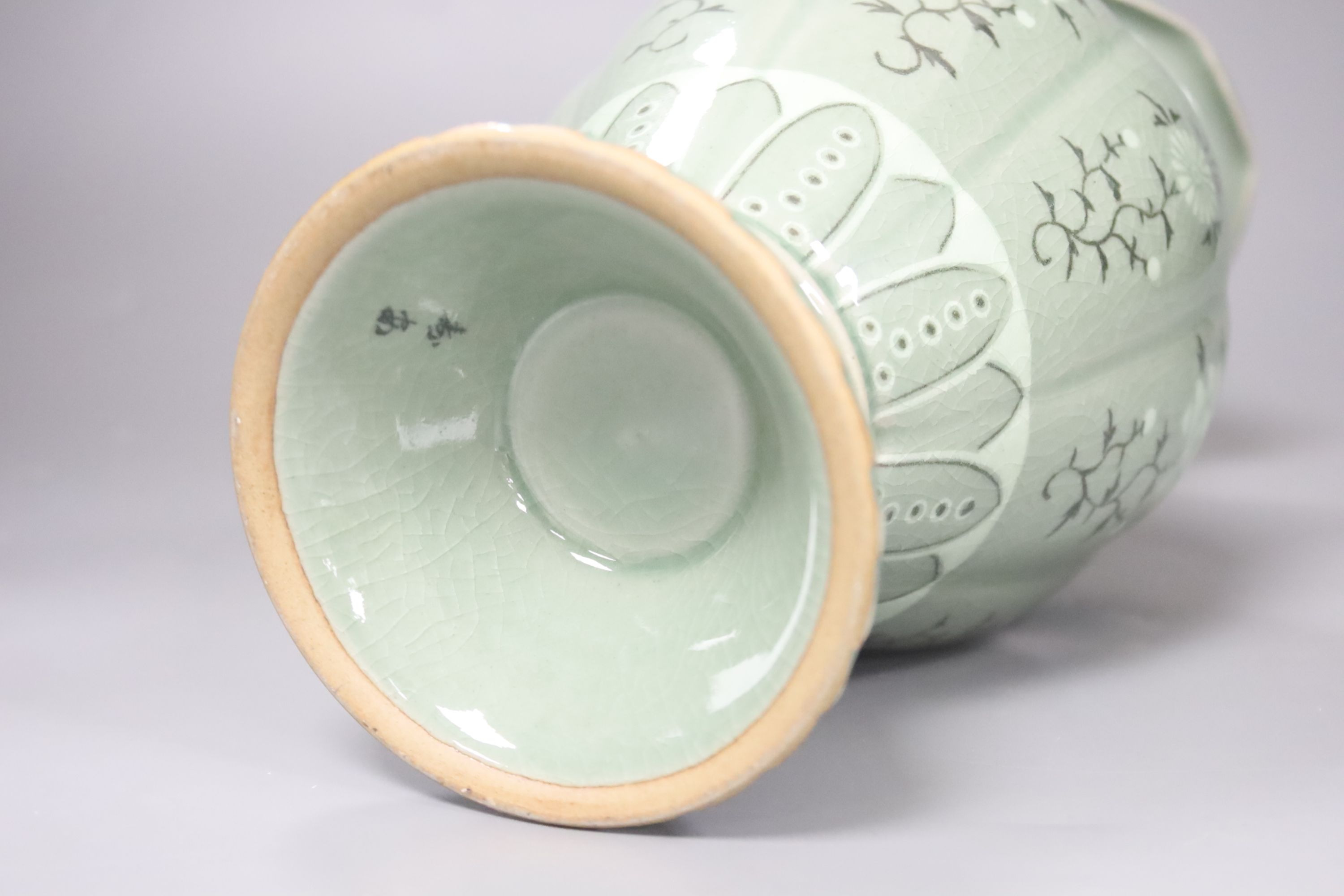 A Chinese green glazed bowl and a Korean celadon vase, height 27cm